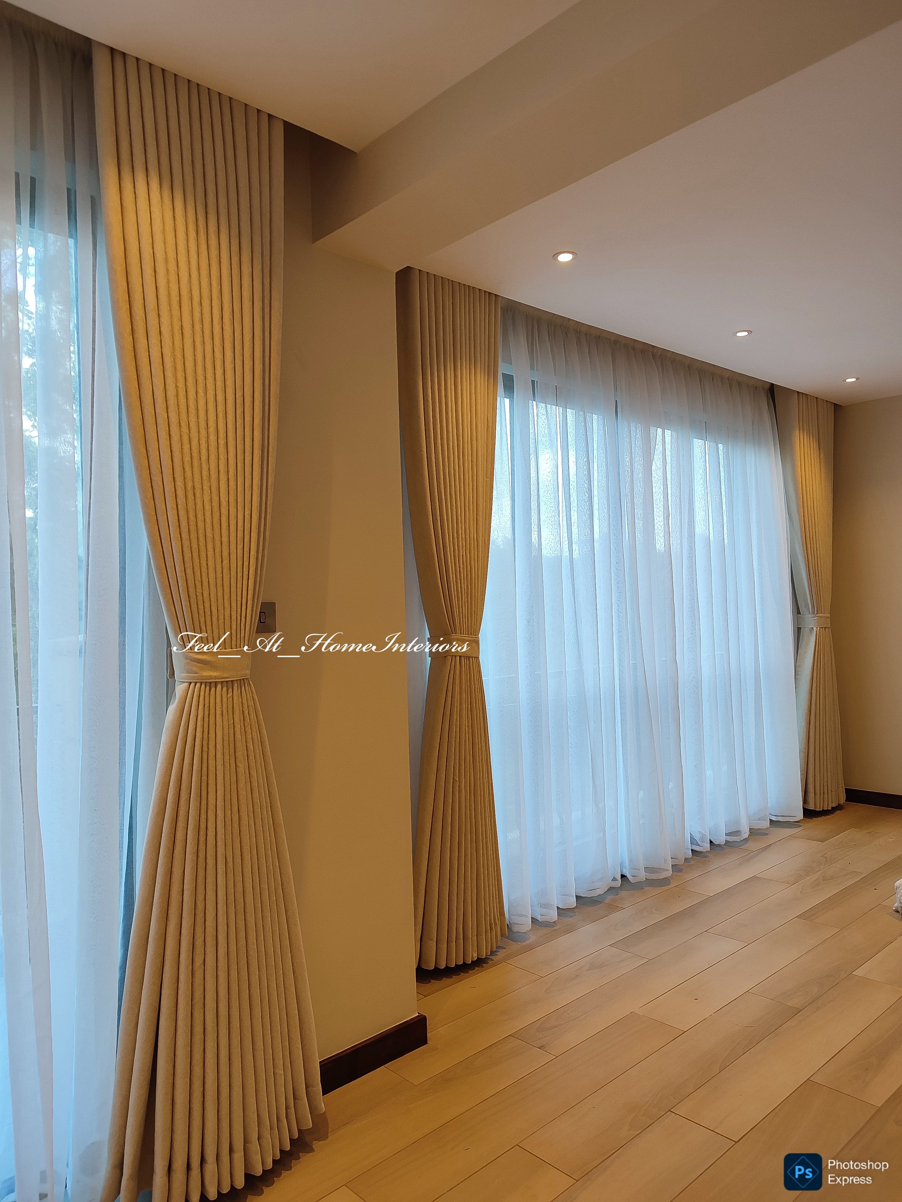 Custom curtain installation by Feel at Home Interiors